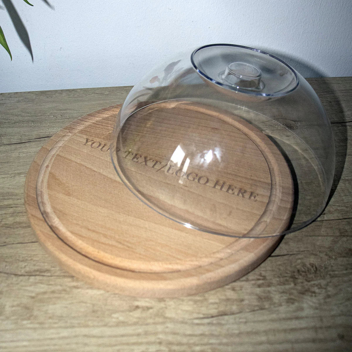 Premium beech wood cutting board with juice groove serving cheese and charcuterie