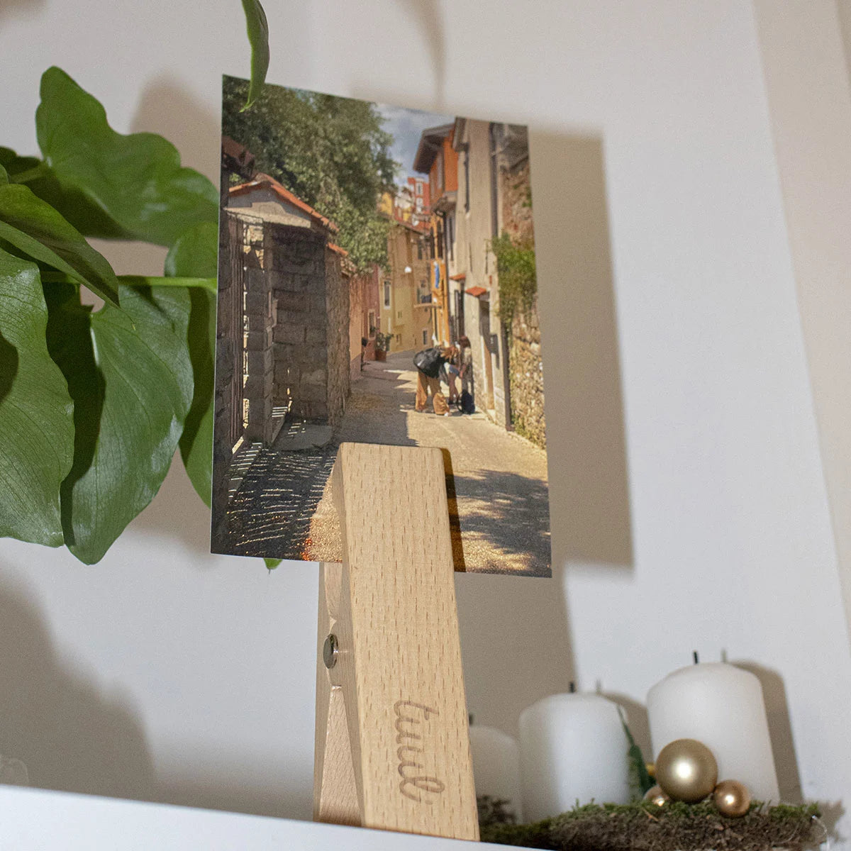 Multi-purpose wooden beach clips being used as paper holders for recipes