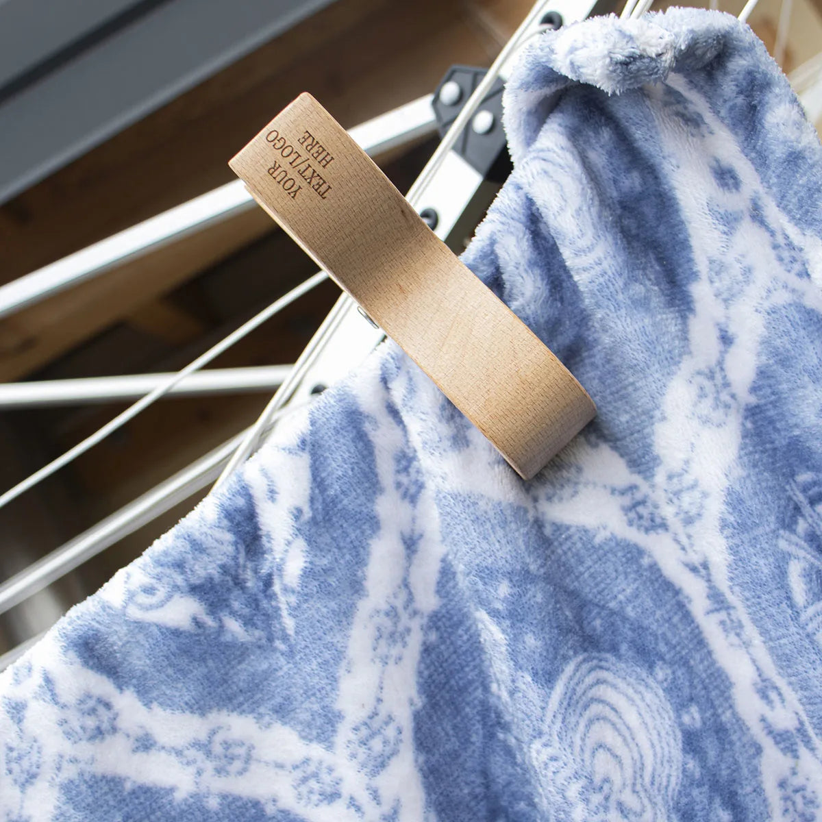 Eco-friendly wooden beach clips showing natural grain and premium craftsmanship