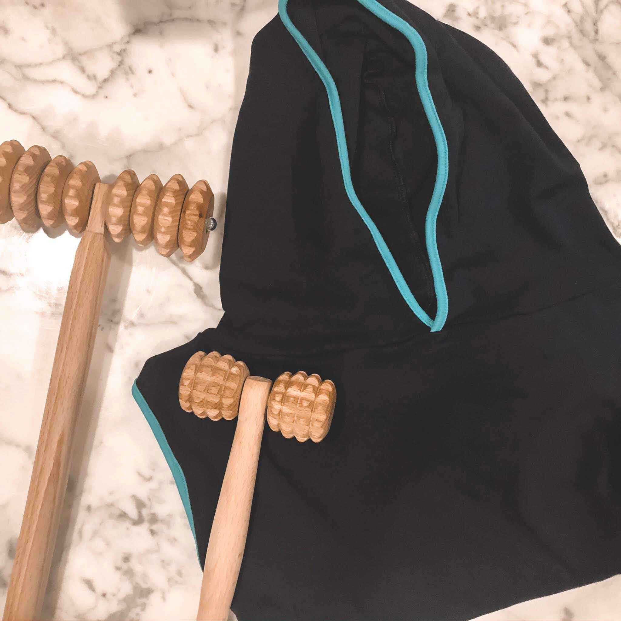 Beechwood facial massagers—mini T roller, gua sha paddle, compact facial set—on a neutral background, Tuuli collection