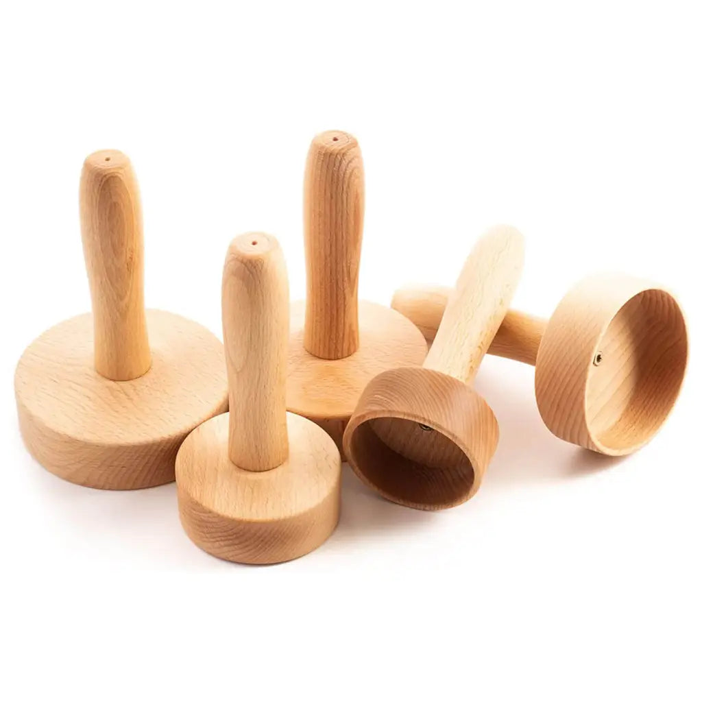 Five beechwood massage cups, full set view on neutral background