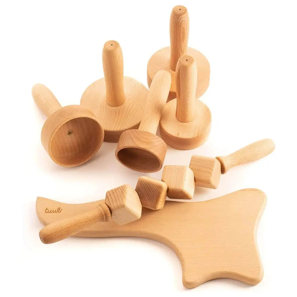 Brazilian-style beechwood massage set on neutral background, full view